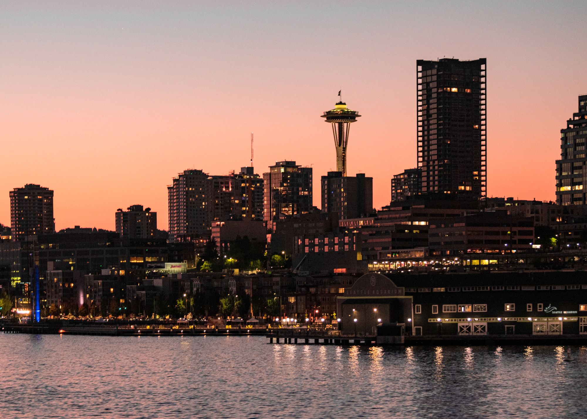 Seattle skyline at sunset with the Space Needle among downtown buildings
